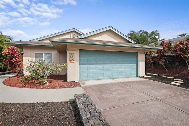 single story home featuring a garage