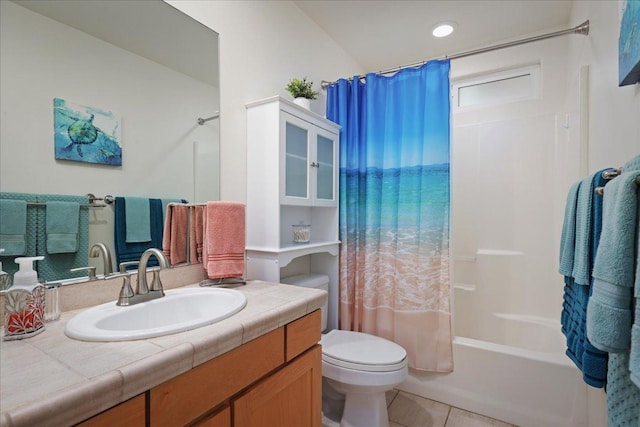 full bathroom featuring tile patterned flooring, shower / bath combination with curtain, toilet, and vanity