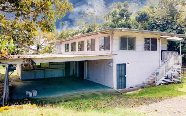 view of front of house with a carport