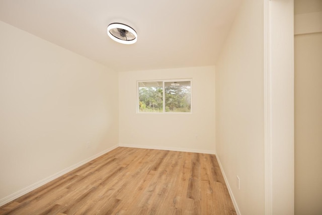 unfurnished room with light hardwood / wood-style flooring