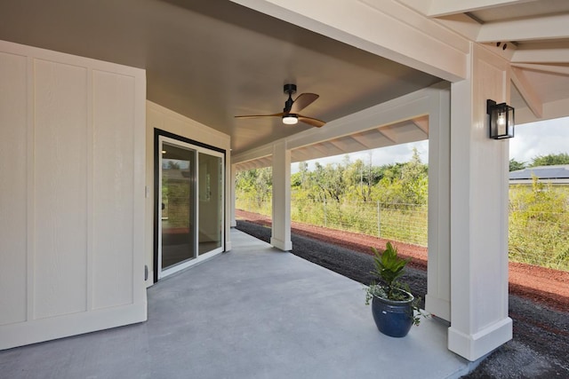 view of patio featuring ceiling fan