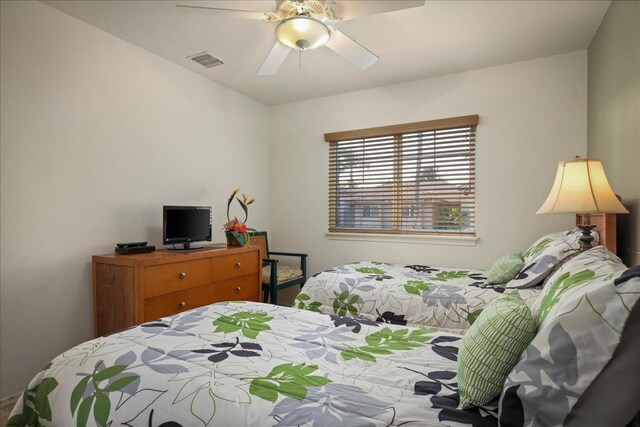 bedroom featuring ceiling fan