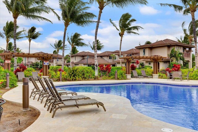 view of swimming pool with a patio area