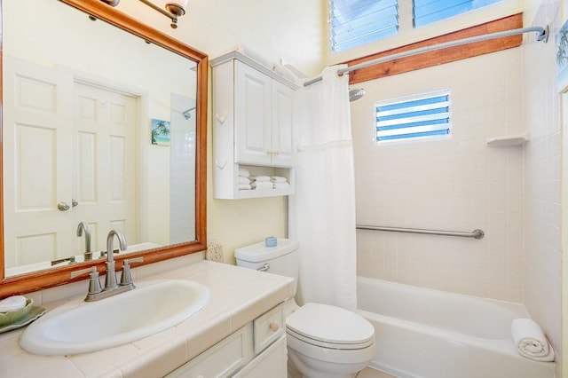 full bathroom featuring shower / tub combo, vanity, and toilet