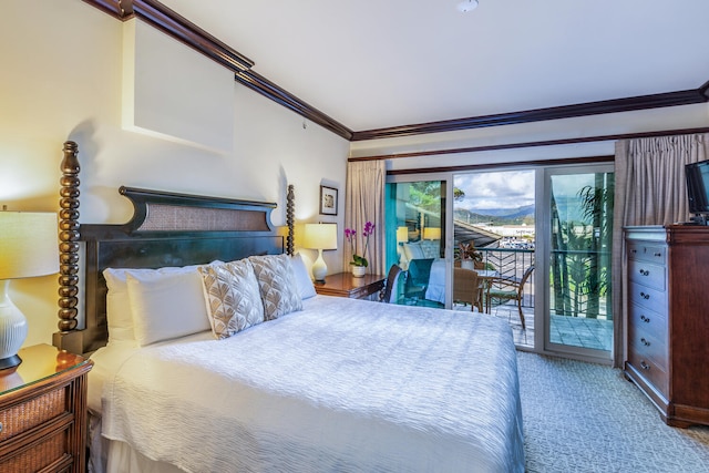 carpeted bedroom featuring access to exterior and ornamental molding