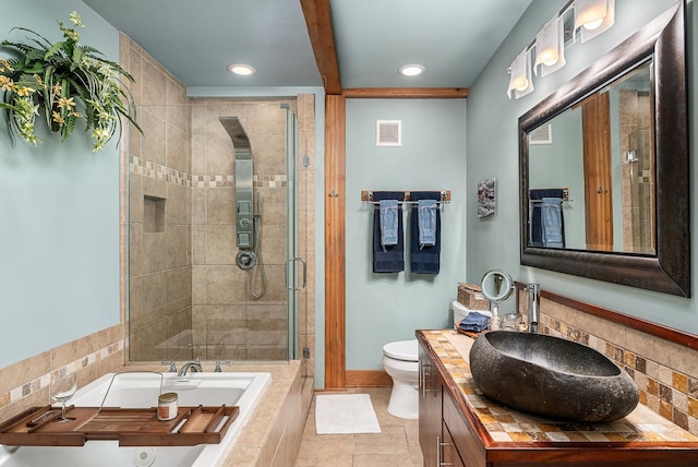 full bathroom featuring tile patterned flooring, vanity, toilet, and plus walk in shower