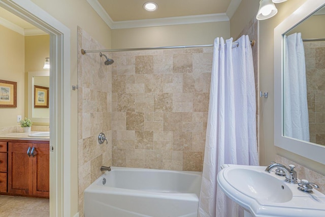 bathroom featuring tile patterned flooring, crown molding, shower / bath combo with shower curtain, and sink