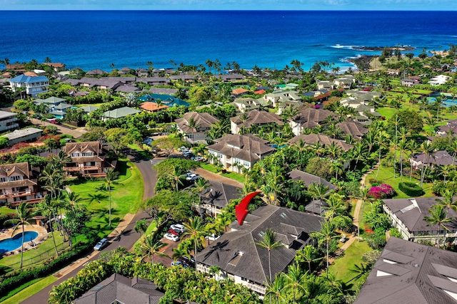 birds eye view of property featuring a water view