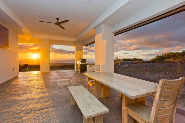 exterior space featuring ceiling fan and an outdoor kitchen