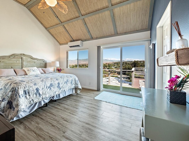 bedroom with ceiling fan, wooden ceiling, a wall mounted AC, light hardwood / wood-style floors, and access to outside