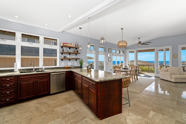 kitchen featuring a kitchen breakfast bar, light stone counters, stainless steel dishwasher, ceiling fan, and sink