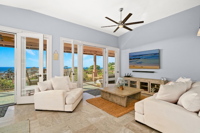 living room featuring french doors, vaulted ceiling, and ceiling fan