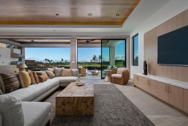 living room featuring wooden ceiling and a wealth of natural light