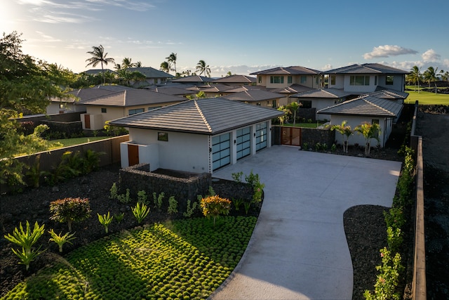 prairie-style home featuring a garage