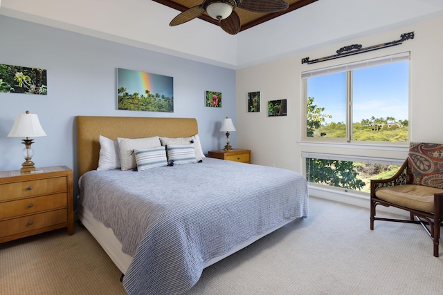 bedroom with light carpet and ceiling fan