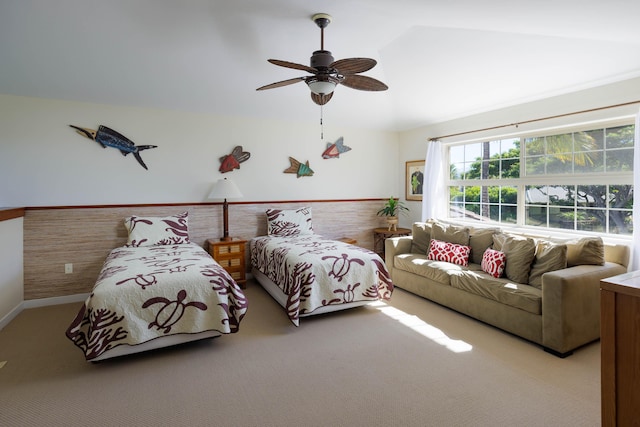 bedroom featuring light colored carpet and ceiling fan