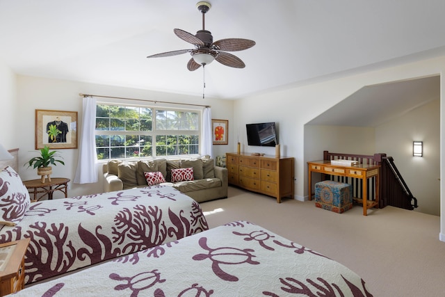 bedroom with ceiling fan and light carpet