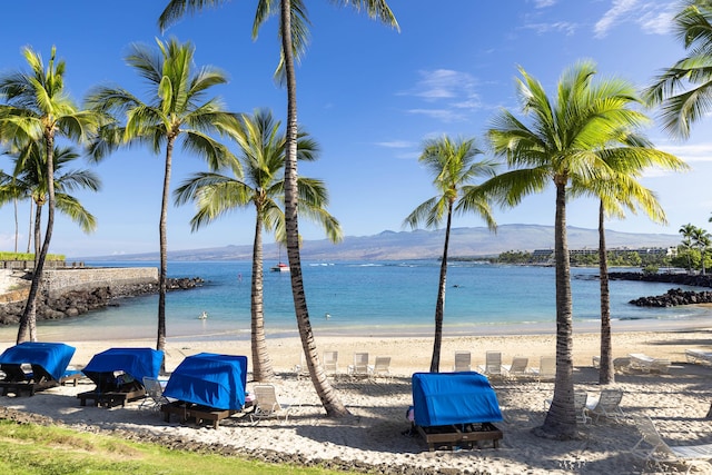 property view of water featuring a mountain view and a view of the beach