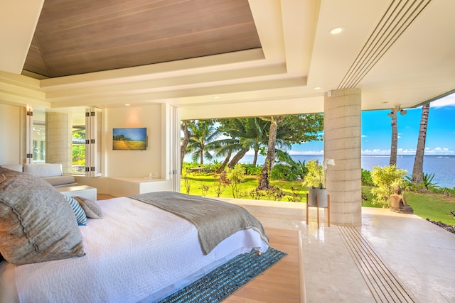 bedroom with a raised ceiling and wooden ceiling