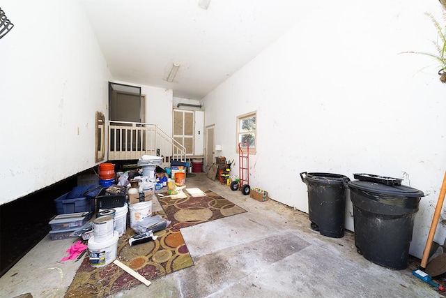 interior space featuring concrete flooring