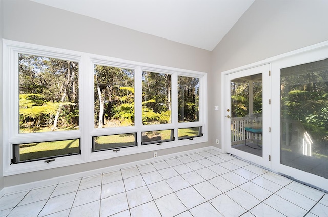 unfurnished sunroom with vaulted ceiling