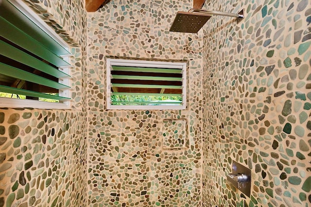 bathroom with a shower