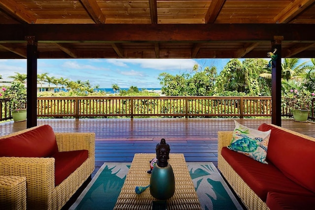 wooden deck featuring an outdoor hangout area