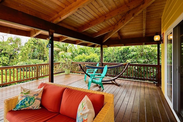 wooden deck with outdoor lounge area