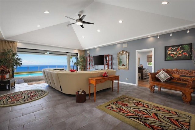 living room featuring a water view, high vaulted ceiling, and ceiling fan