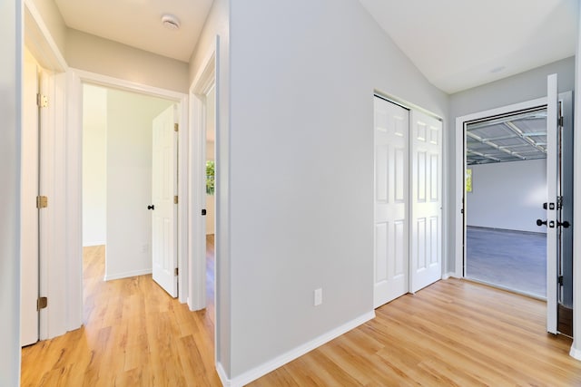 hallway featuring light wood-type flooring