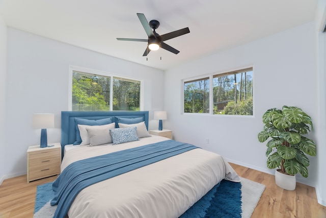 bedroom featuring ceiling fan and light hardwood / wood-style flooring