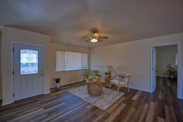 foyer entrance featuring ceiling fan and dark hardwood / wood-style flooring