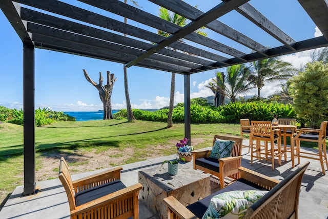 view of patio with an outdoor living space, a pergola, and a water view