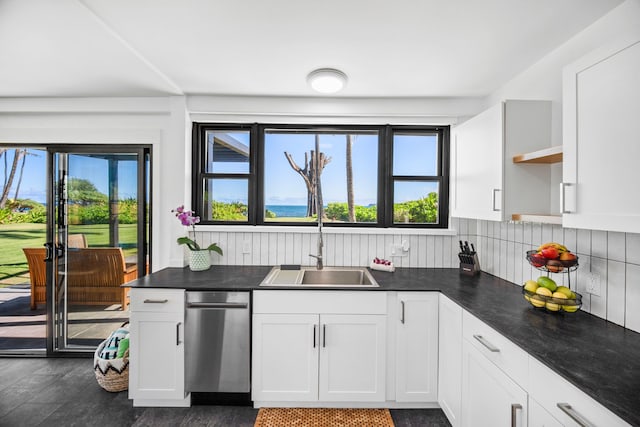 kitchen with white cabinets, decorative backsplash, dark hardwood / wood-style floors, and sink