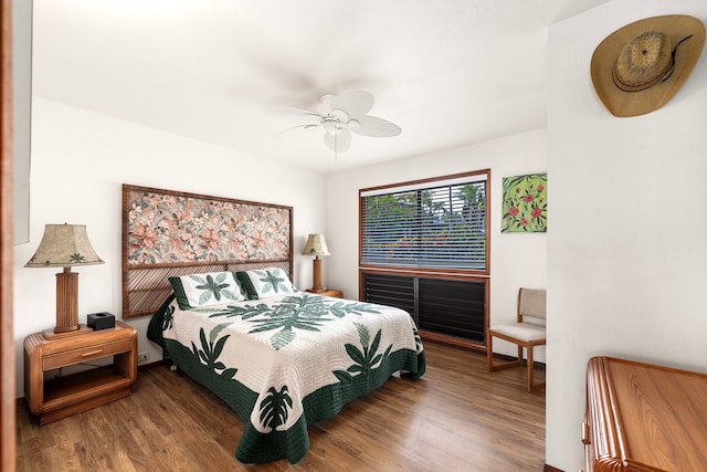 bedroom featuring ceiling fan and hardwood / wood-style flooring