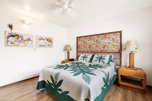 bedroom featuring wood-type flooring and ceiling fan