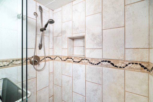 details featuring a tile shower