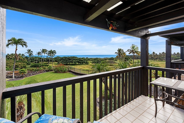 balcony featuring a water view