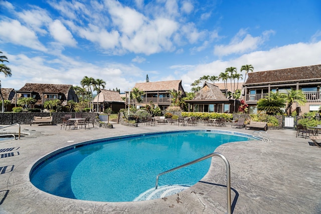 view of pool featuring a gazebo and a patio