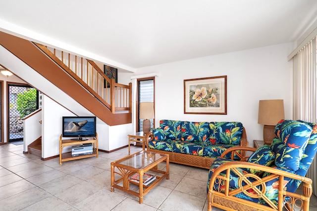 tiled living room featuring plenty of natural light