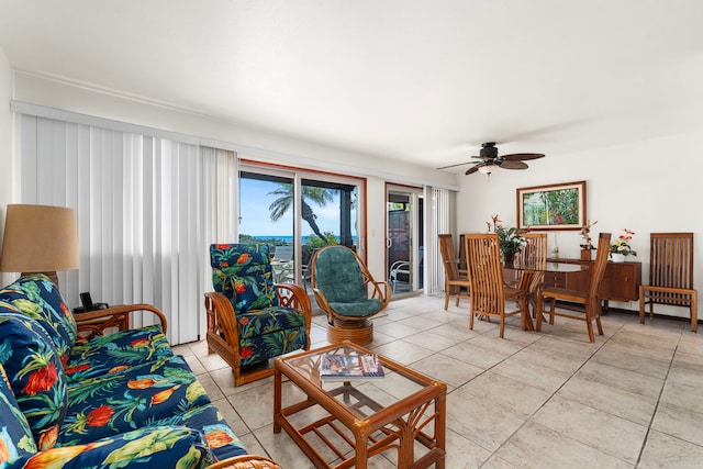 living room featuring ceiling fan and light tile patterned floors