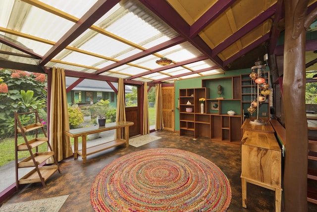 sunroom with lofted ceiling