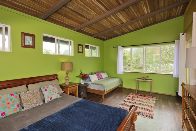 bedroom with lofted ceiling with beams, dark wood-type flooring, and wood ceiling