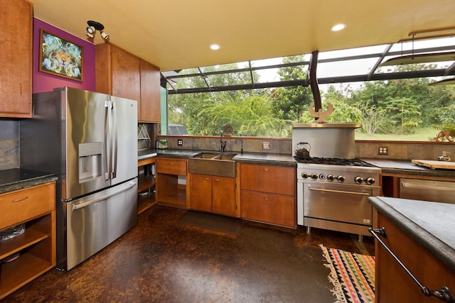 kitchen featuring decorative backsplash, sink, and stainless steel appliances