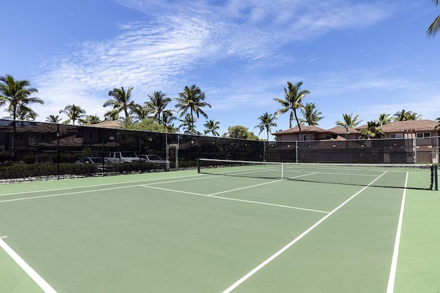 view of sport court with basketball hoop