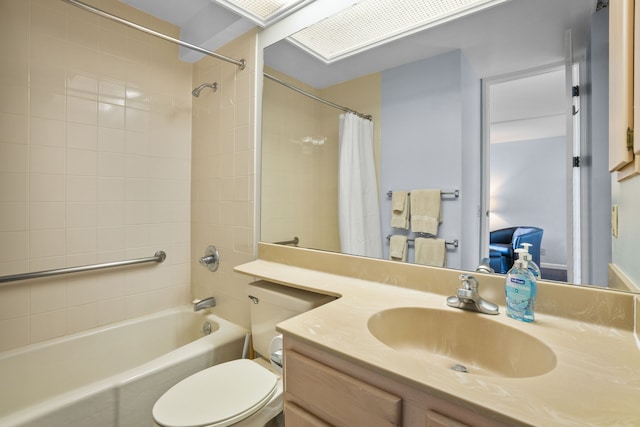 full bathroom with vanity, shower / bath combination with curtain, and toilet