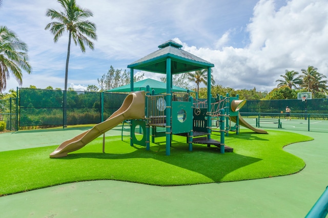 view of playground with tennis court