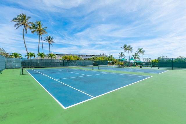 view of sport court with basketball hoop