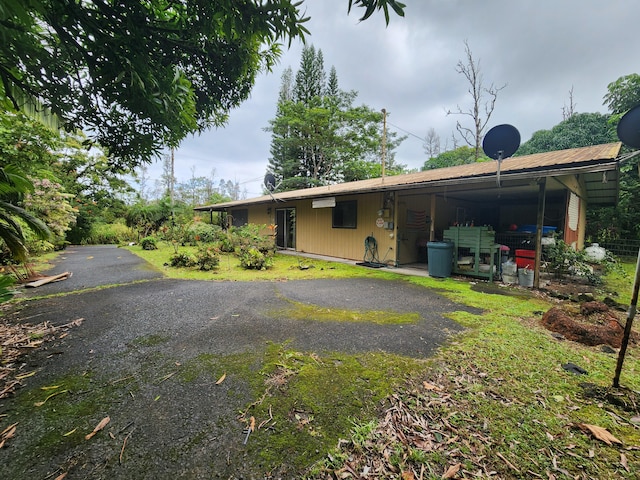 exterior space featuring driveway