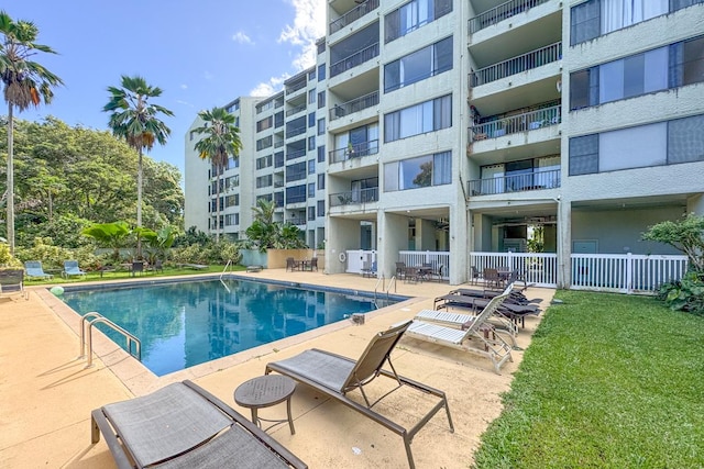 view of swimming pool featuring a patio area